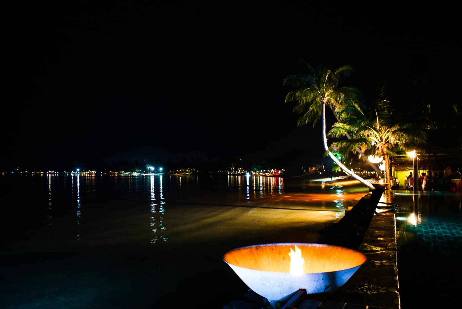 The Fire Bowl Is Set On The Edge Of The Pool, Located By The Sea.